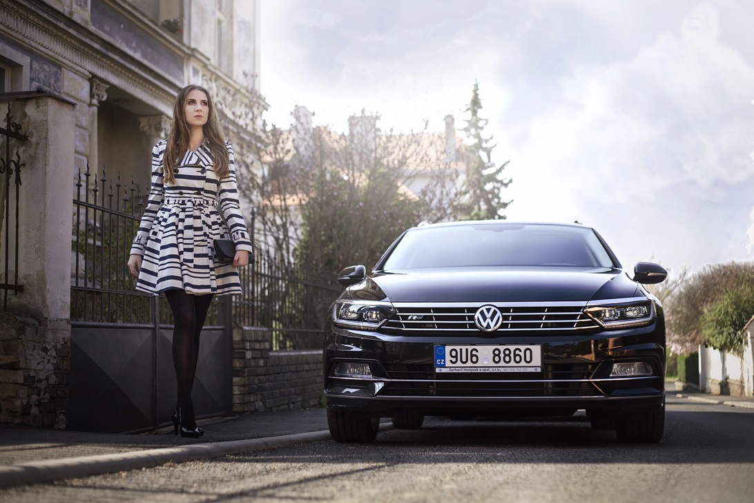 volkswagen car in street and woman
