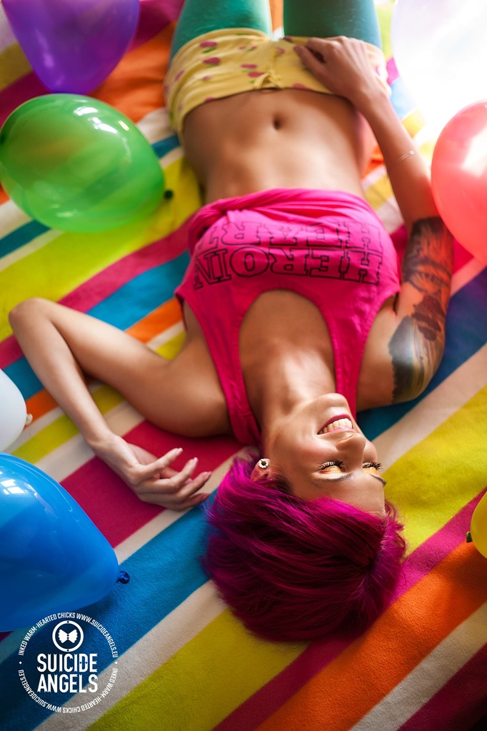 cute girl in pink croptop and short pink hair and big boobies